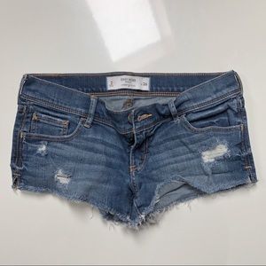 Gilly Hicks distressed medium wash denim shorts